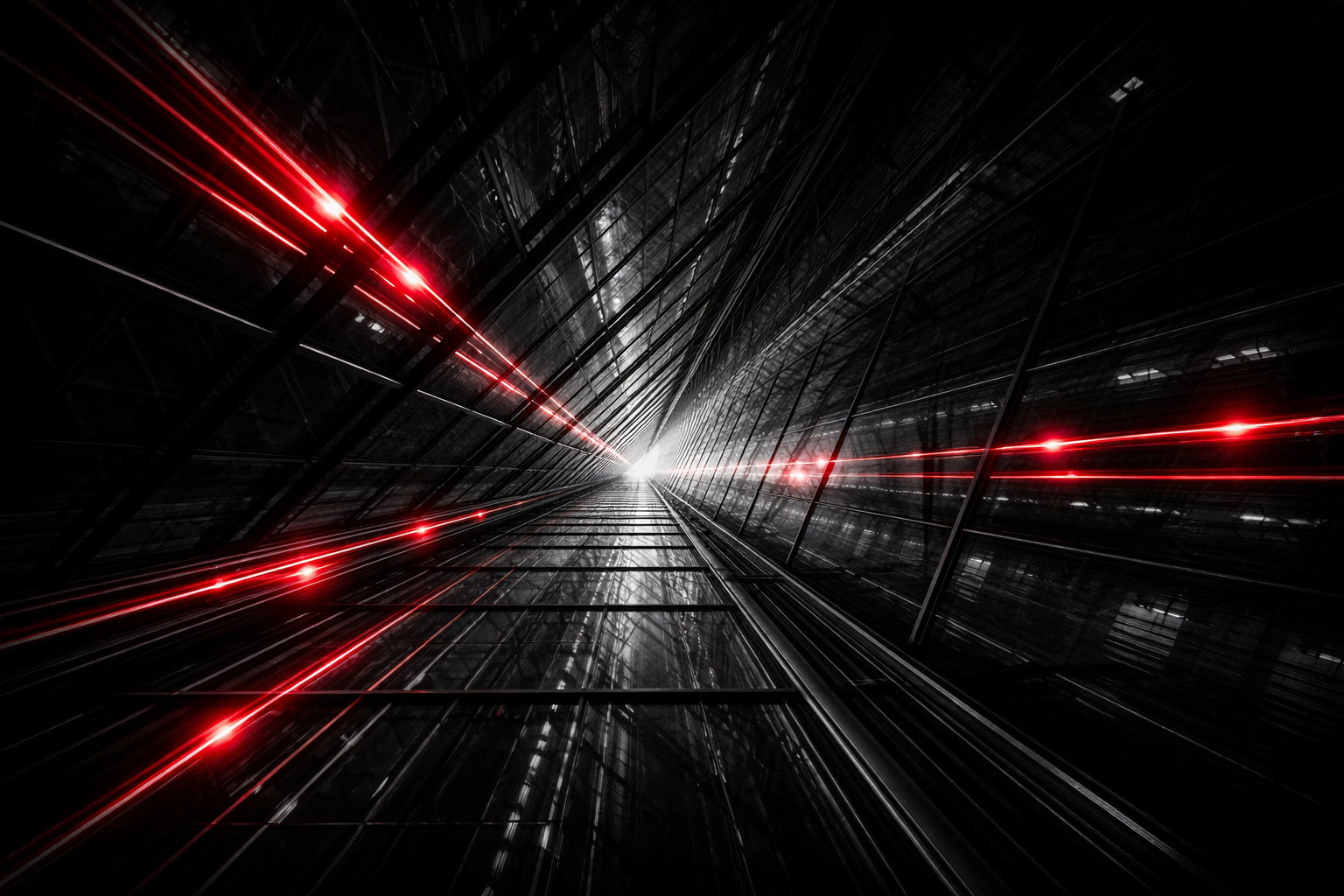 Struttura tecnologica illuminata da tracce luminose rosse, simbolo di continuità operativa